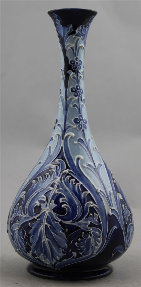 A Macintyre Moorcroft Florian Ware Iris pattern bottle vase, c.1900, 24.5cm